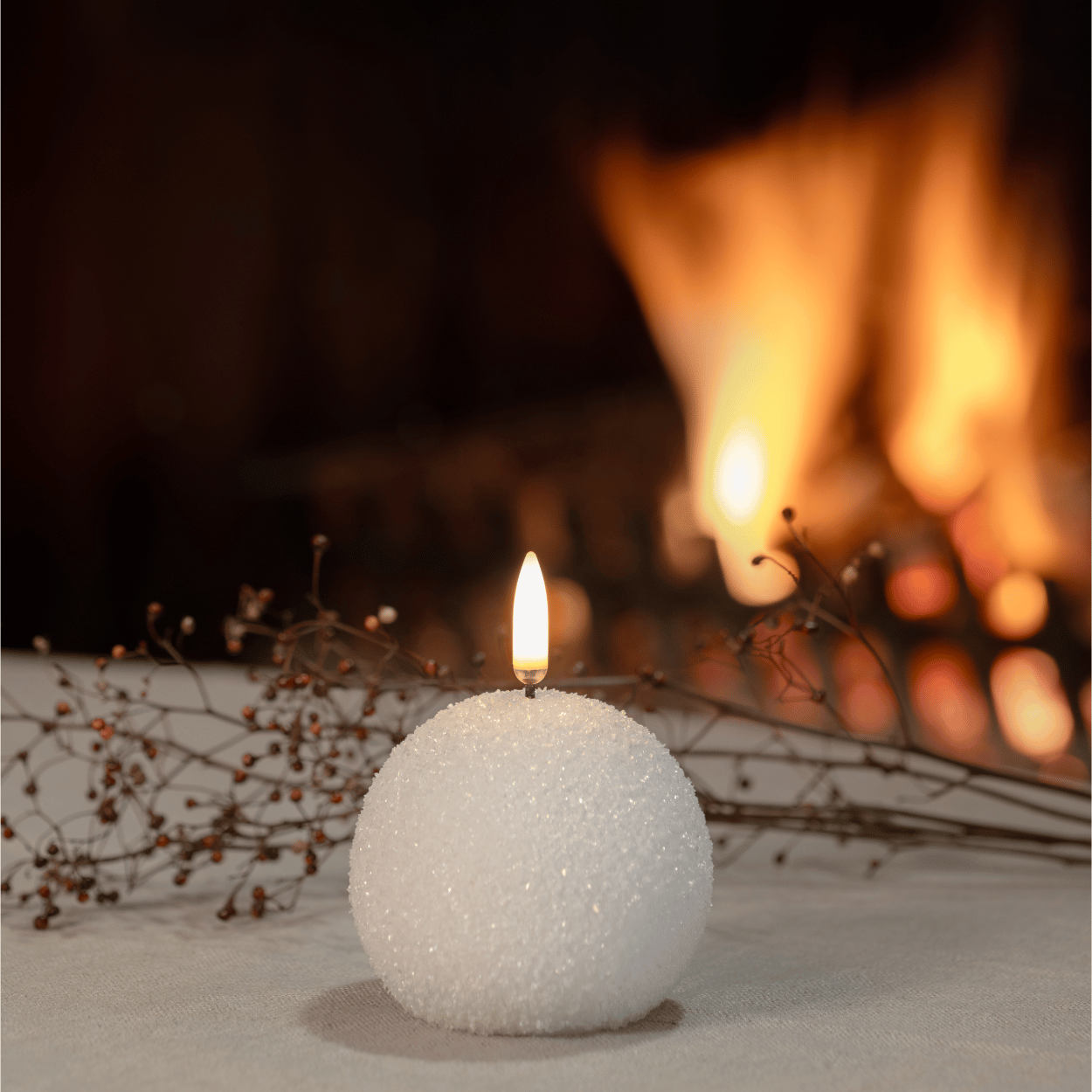 Winter-Themed Flameless Candle with Decorative Glitter Accent